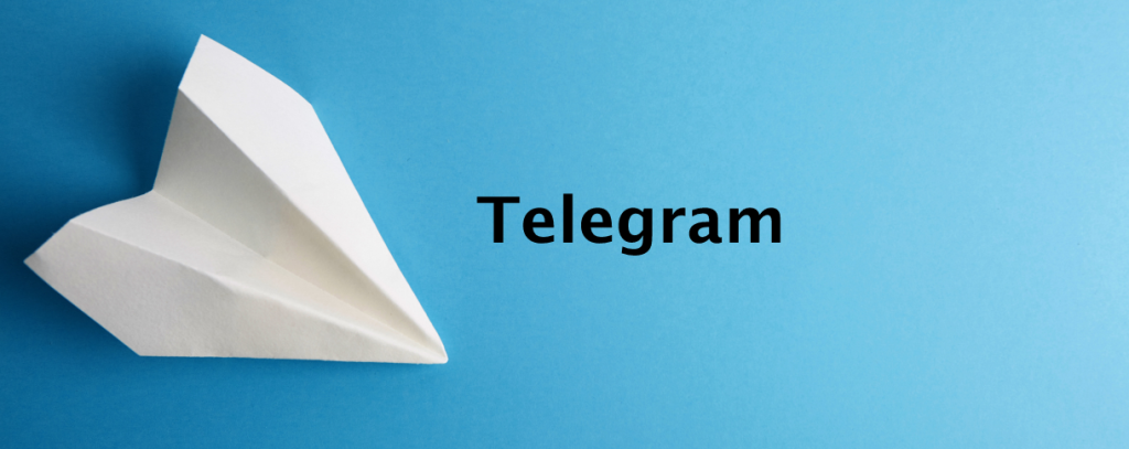 Telegram banner with paper plan Telegram logo on a blue background.